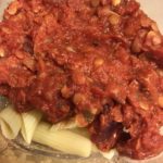 lentil bolognese tomato sauce on pasta