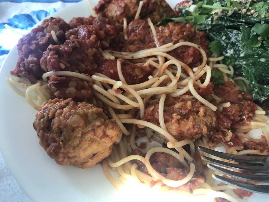 Spaghetti with meatballs and lentil bolognese sauce