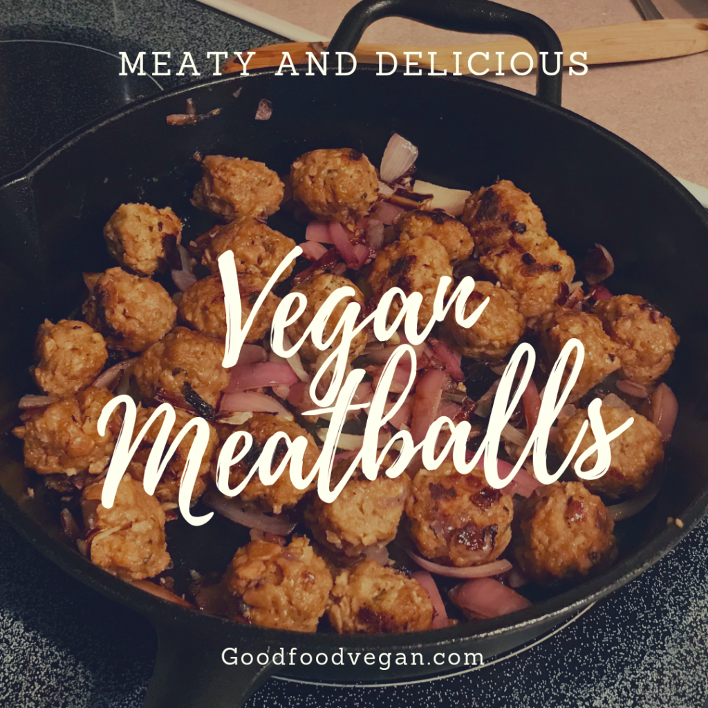 Vegan meatballs in a frying pan with onions