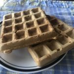 light and fluffy vegan waffles on a plate