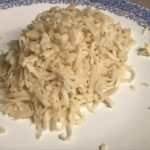 grated vegan mozzarella cheese on a plate