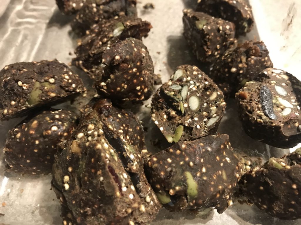 fruit bars with chocolate, pumpkin seeds, and quinoa